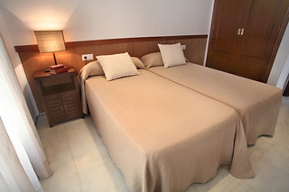 Imagen de la habitación del Apartamentos Patios de Alcántara. Foto 12