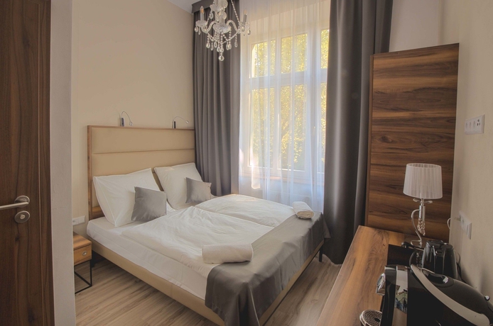 Imagen de la habitación del Apartamentos Pergamin Royal Apartments. Foto 6