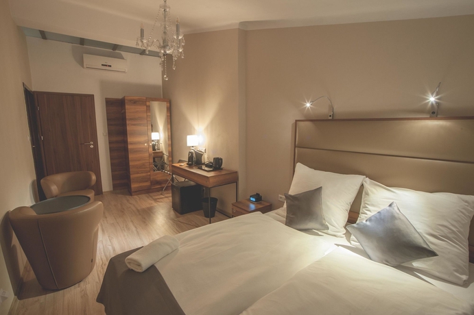 Imagen de la habitación del Apartamentos Pergamin Royal Apartments. Foto 8