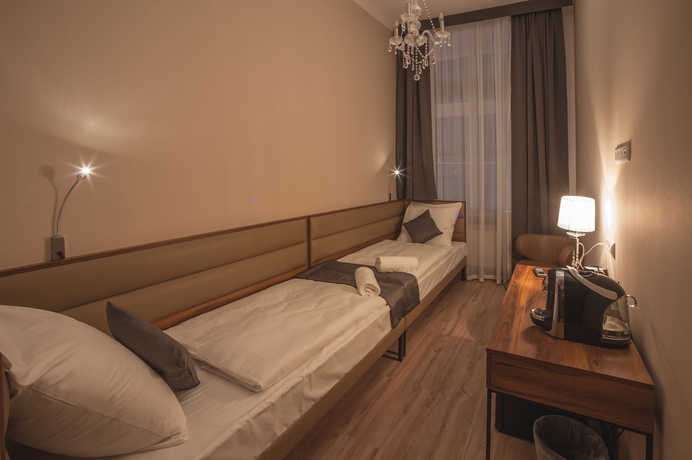 Imagen de la habitación del Apartamentos Pergamin Royal Apartments. Foto 11