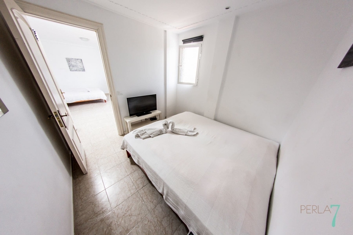 Imagen de la habitación del Apartamentos Perla Seven. Foto 11