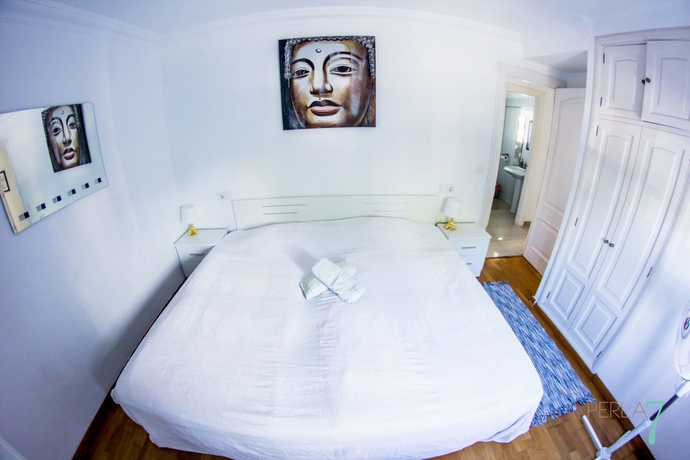 Imagen de la habitación del Apartamentos Perla Seven. Foto 12