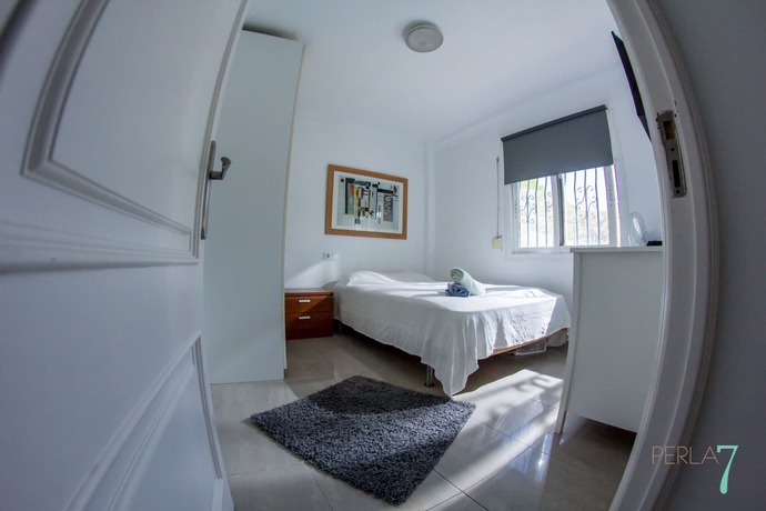 Imagen de la habitación del Apartamentos Perla Seven. Foto 13