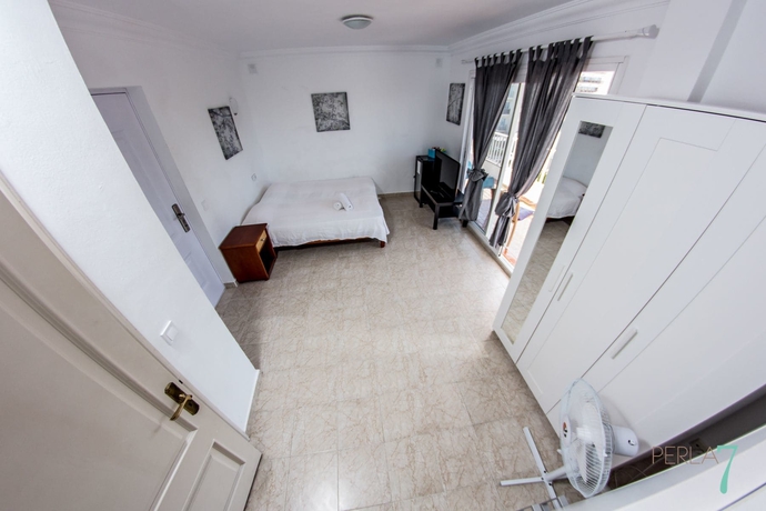 Imagen de la habitación del Apartamentos Perla Seven. Foto 15