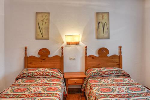 Imagen de la habitación del Apartamentos Petronilla. Foto 2