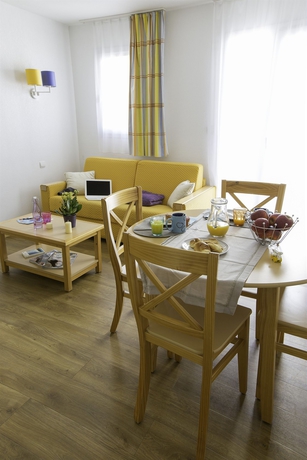 Imagen de los interiores del Apartamentos Pierre and Vacances Résidence La Baie Des Sables. Foto 4