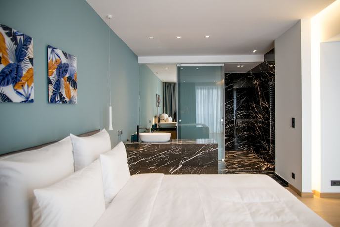 Imagen de la habitación del Apartamentos Pinacota Suites Athens. Foto 17