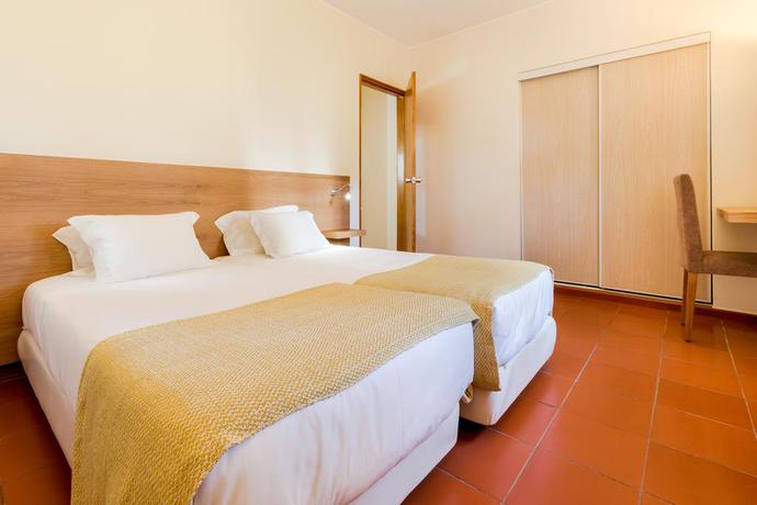 Imagen de la habitación del Apartamentos Pinhal Da Marina Turisticos. Foto 4