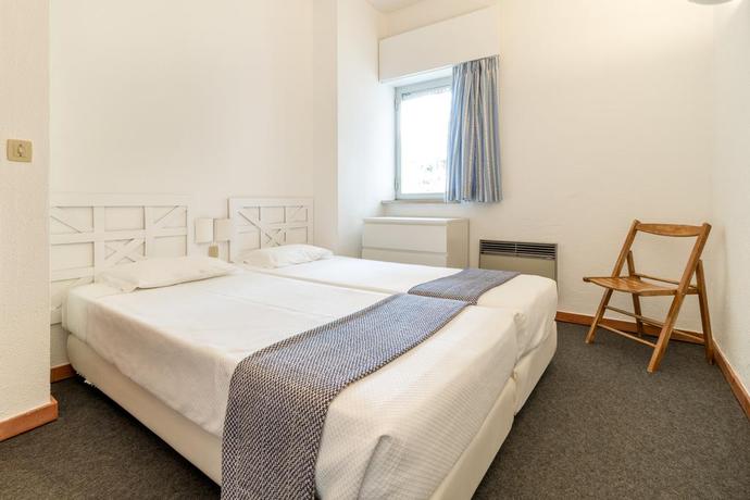 Imagen de la habitación del Apartamentos Pinhal Da Marina Turisticos. Foto 5