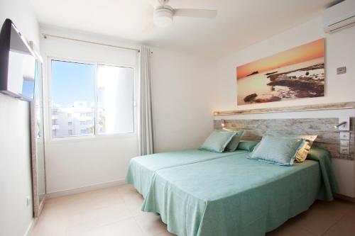 Imagen de la habitación del Apartamentos Playa Bella Beach Apartments. Foto 2