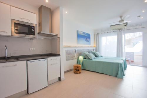 Imagen de la habitación del Apartamentos Playa Bella Beach Apartments. Foto 10