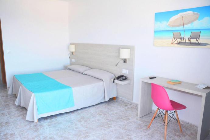 Imagen de la habitación del Apartamentos Playa Moreia. Foto 11
