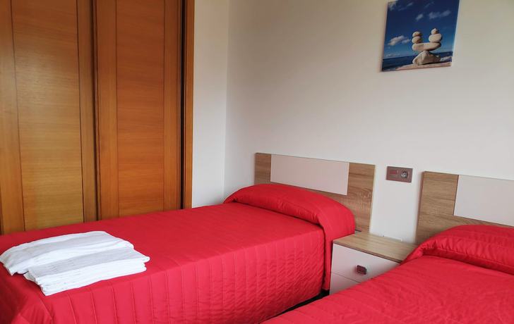 Imagen de la habitación del Apartamentos Playa de La Lanzada 3000. Foto 13