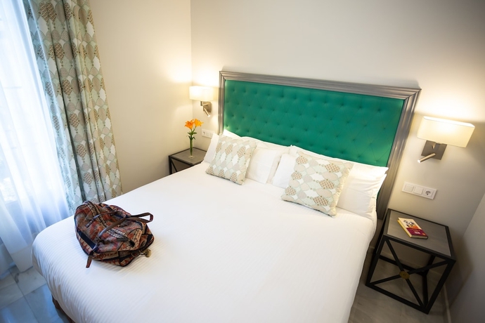 Imagen de la habitación del Apartamentos Plazuela del Carbón Suites. Foto 6