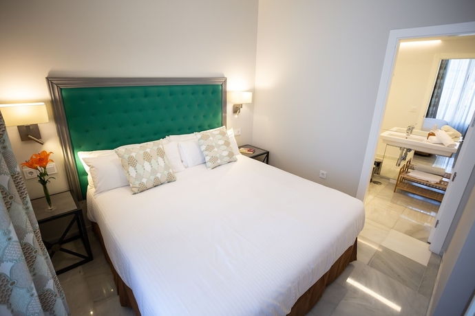 Imagen de la habitación del Apartamentos Plazuela del Carbón Suites. Foto 7