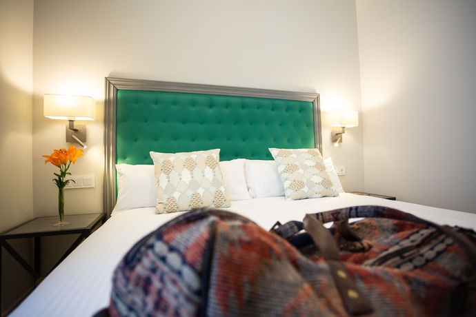 Imagen de la habitación del Apartamentos Plazuela del Carbón Suites. Foto 11