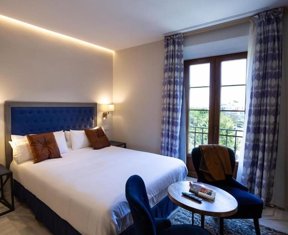 Imagen de la habitación del Apartamentos Plazuela del Carbón Suites. Foto 18