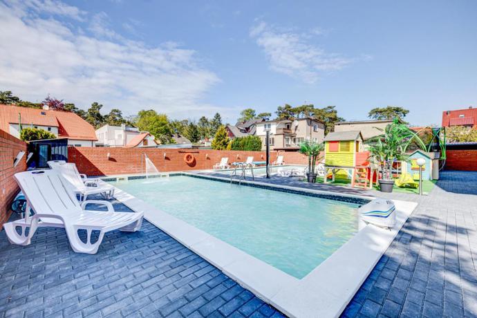 Imagen de la piscina del Apartamentos Pod Winogronem - Apartamenty Z Basenem I Wyżywieniem. Foto 9