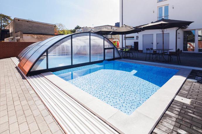 Imagen de la piscina del Apartamentos Pod Winogronem - Apartamenty Z Basenem I Wyżywieniem. Foto 10