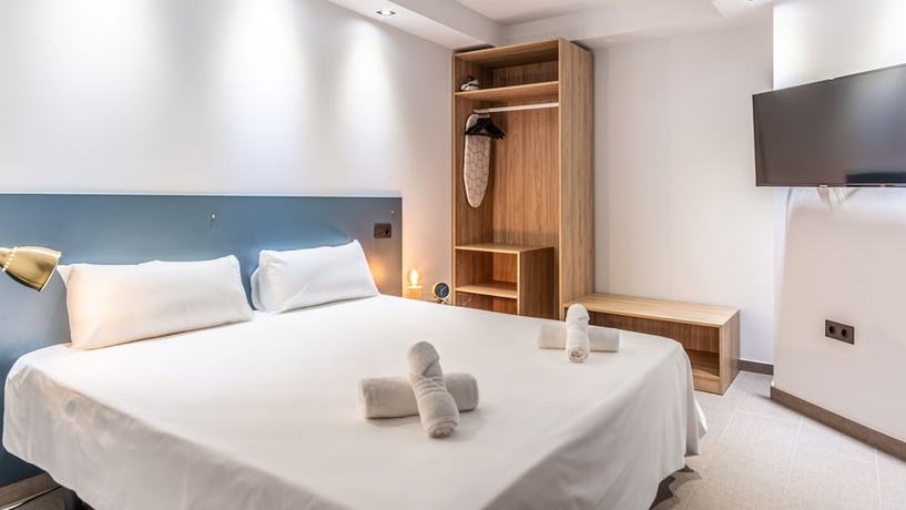 Imagen de la habitación del Apartamentos Poem Suites. Foto 10
