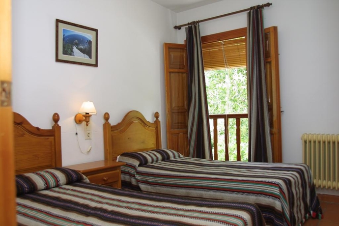 Imagen de la habitación del Apartamentos Poqueira, Capileira ( Alpujarra ). Foto 3