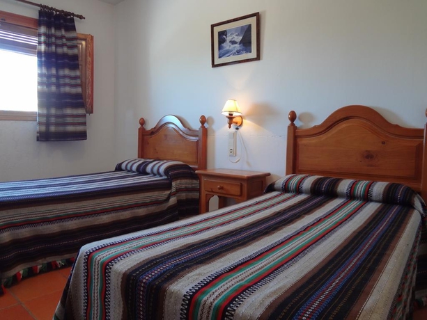 Imagen de la habitación del Apartamentos Poqueira, Capileira ( Alpujarra ). Foto 5