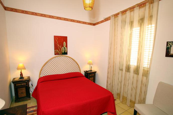 Imagen de la habitación del Apartamentos Porta Carini Residence. Foto 7