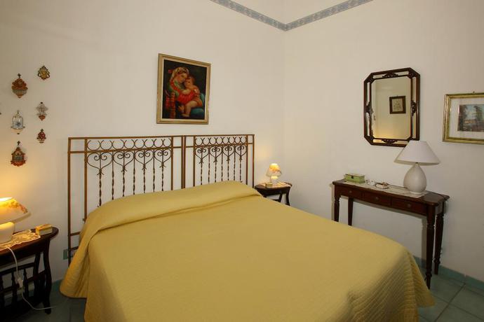 Imagen de la habitación del Apartamentos Porta Carini Residence. Foto 8