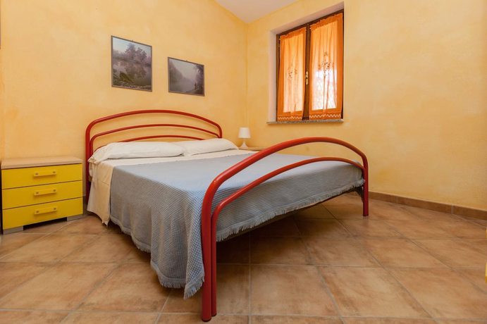 Imagen de la habitación del Apartamentos Porto Ottiolu Resort. Foto 9