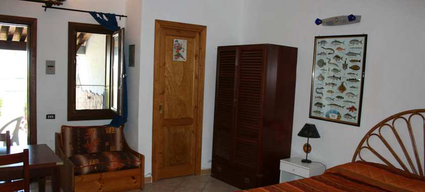 Imagen de la habitación del Apartamentos Porto Ottiolu Resort. Foto 10