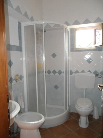 Imagen de la habitación del Apartamentos Porto Ottiolu Resort. Foto 14