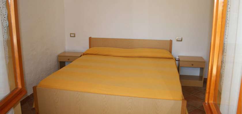 Imagen de la habitación del Apartamentos Porto Ottiolu Resort. Foto 15