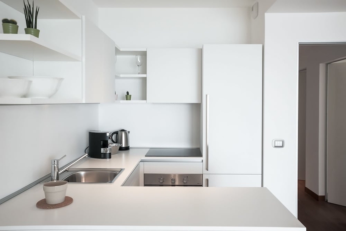 Imagen de la habitación del Apartamentos Portopiccolo Apartments. Foto 6