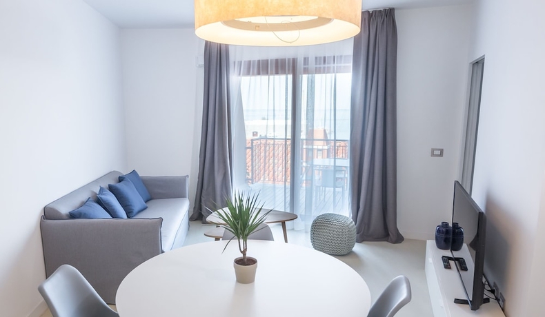 Imagen de la habitación del Apartamentos Portopiccolo Apartments. Foto 7