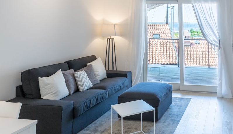 Imagen de la habitación del Apartamentos Portopiccolo Apartments. Foto 11