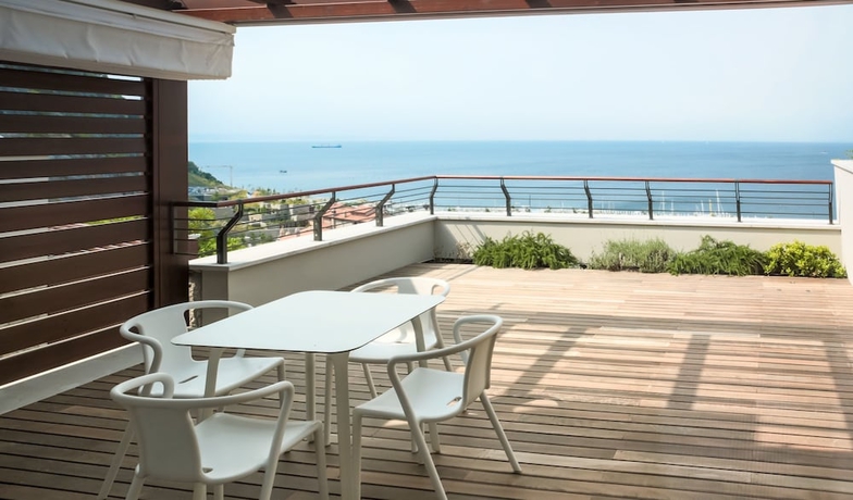 Imagen de la habitación del Apartamentos Portopiccolo Apartments. Foto 12