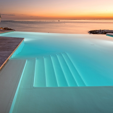 Imagen de la piscina del Apartamentos Portopiccolo Apartments. Foto 17