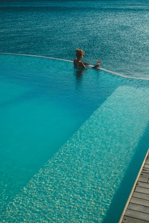 Imagen de la piscina del Apartamentos Portopiccolo Apartments. Foto 18