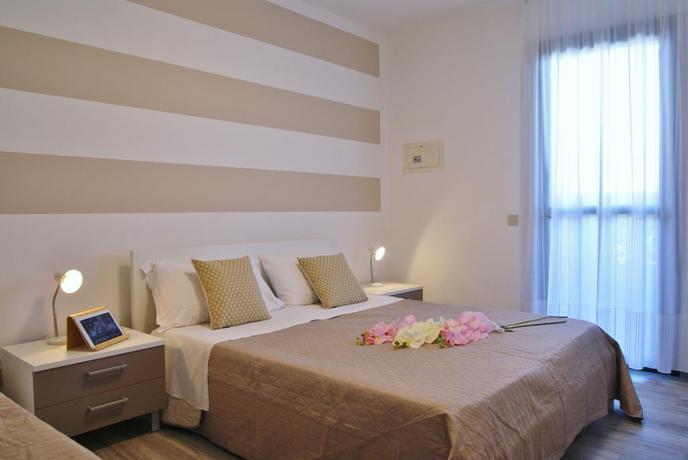 Imagen de la habitación del Apartamentos Portosole E Tamerici Apartments. Foto 2