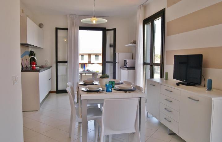 Imagen de la habitación del Apartamentos Portosole E Tamerici Apartments. Foto 3