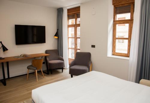 Imagen de la habitación del Apartamentos Prisma Suites. Foto 17