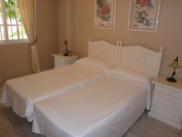 Imagen de la habitación del Apartamentos Pueblo Quinta. Foto 3