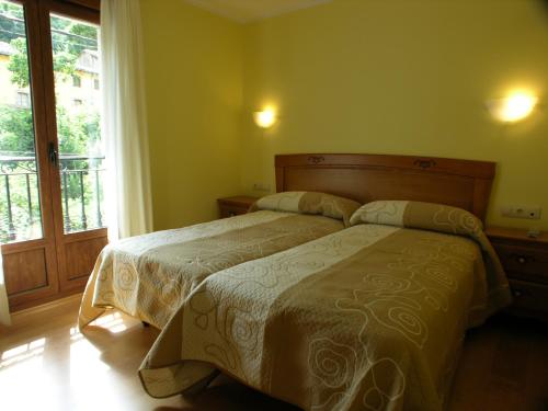 Imagen de la habitación del Apartamentos Puente La Molina. Foto 9