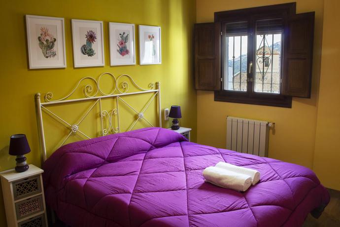 Imagen de la habitación del Apartamentos Puerta Bubión. Foto 17