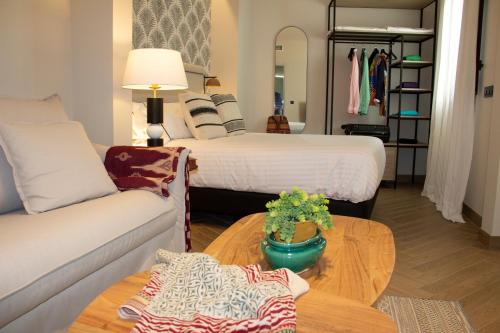 Imagen de la habitación del Apartamentos Puerta de la Ribera Suites. Foto 12