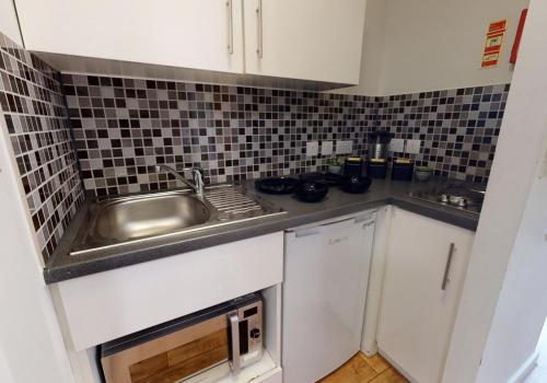 Imagen general del Apartamentos Raffles House Apartments - IQ Sterling Court. Foto 12