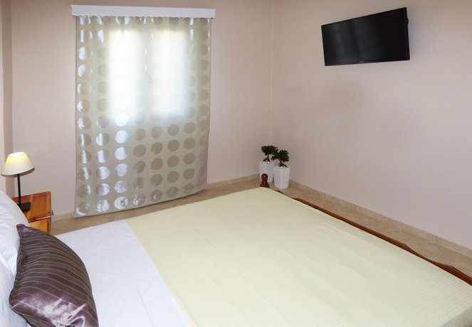 Imagen de la habitación del Apartamentos Rampelia Apartments. Foto 2