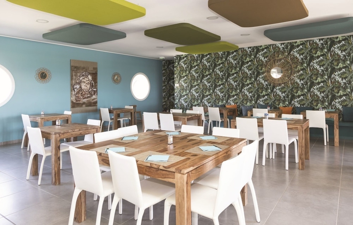 Imagen del bar/restaurante del Apartamentos R&eacute;sidence Acqua Linda. Foto 3