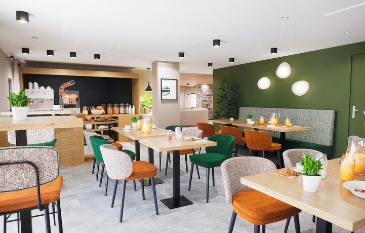 Imagen del bar/restaurante del Apartamentos R&eacute;sidence Odalys Le Mont dAuron. Foto 9
