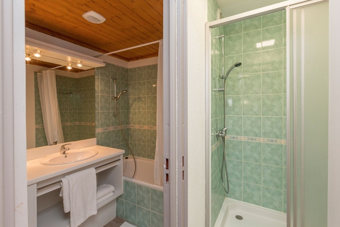 Imagen de la habitación del Apartamentos R&eacute;sidence Odalys Les Lumi&egrave;res De Neige. Foto 9